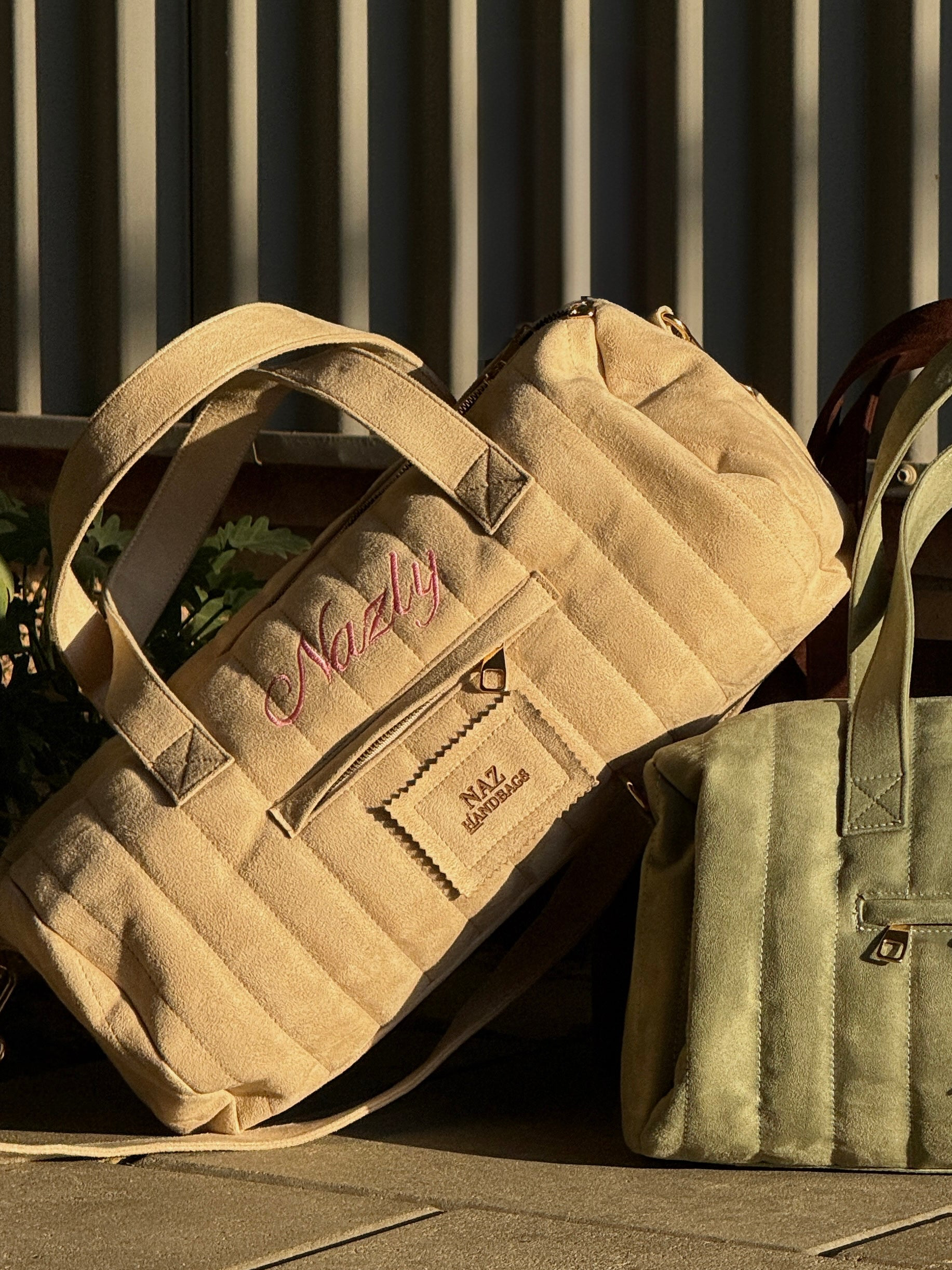 The namestitch duffle in offwhite