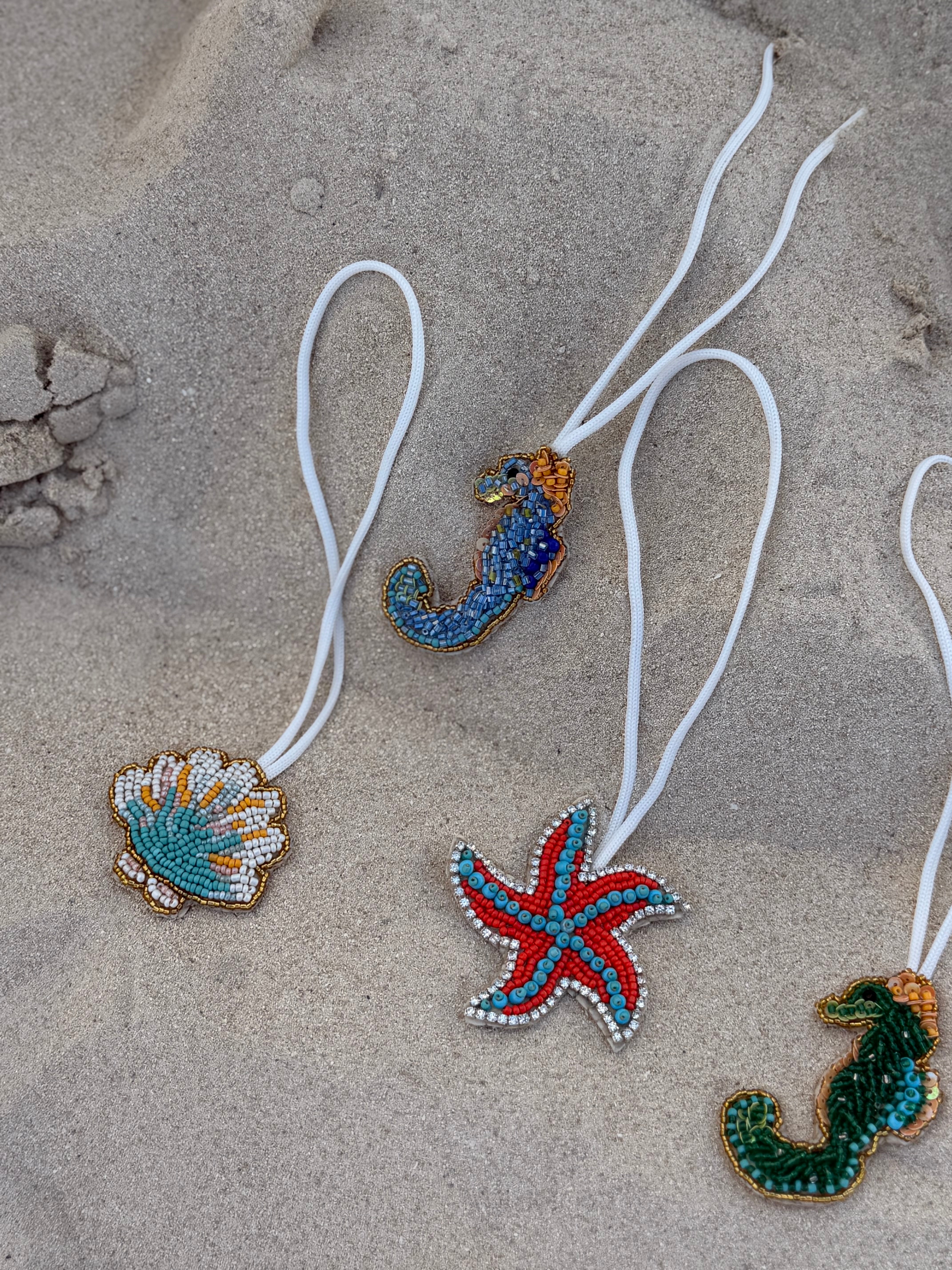 Seashell charm embroidery