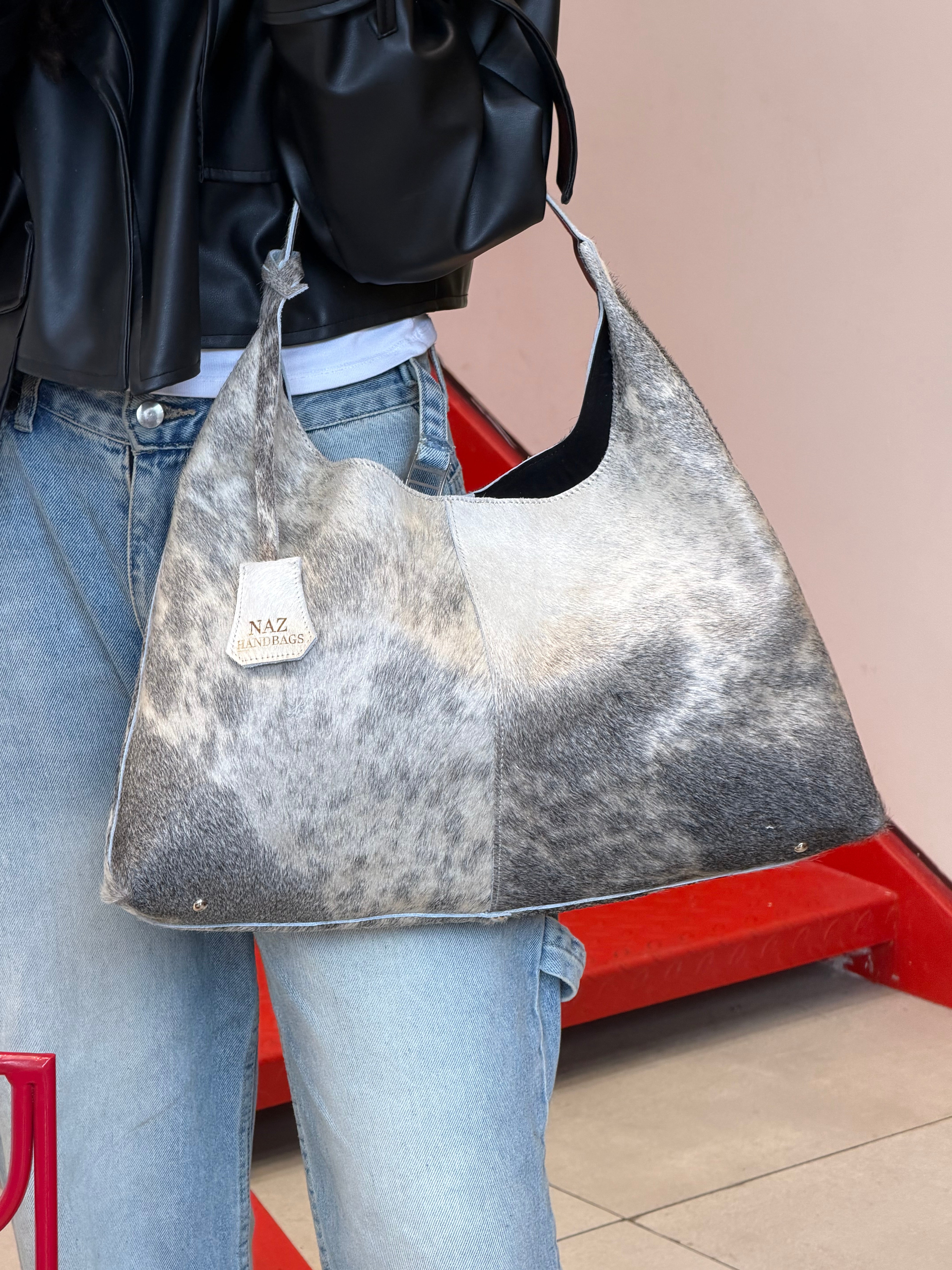 Cow hide tote bags