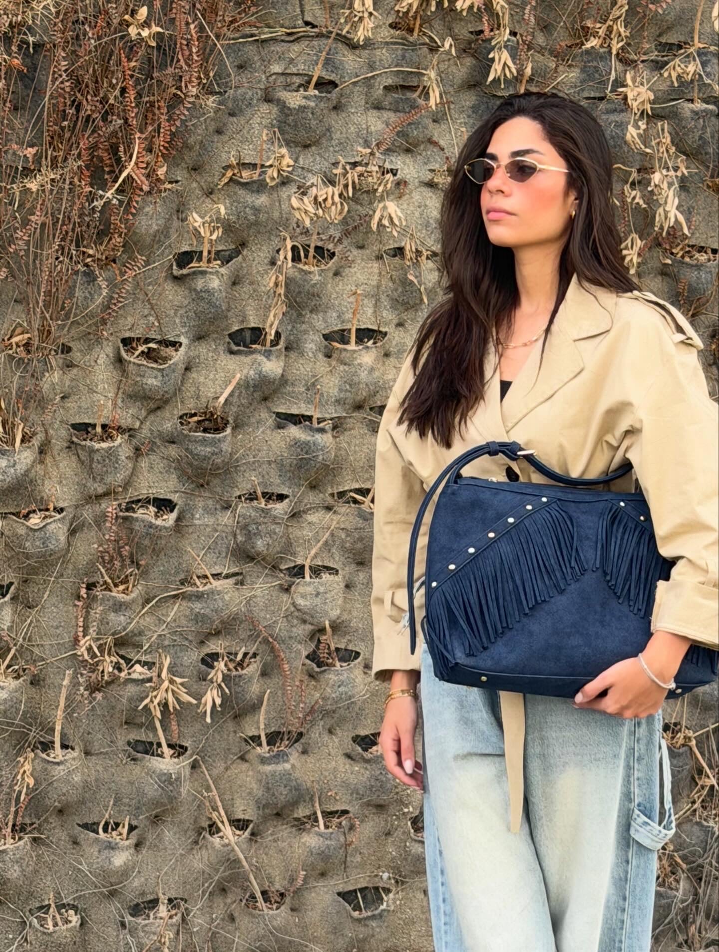 The Navy flaire fringes bag